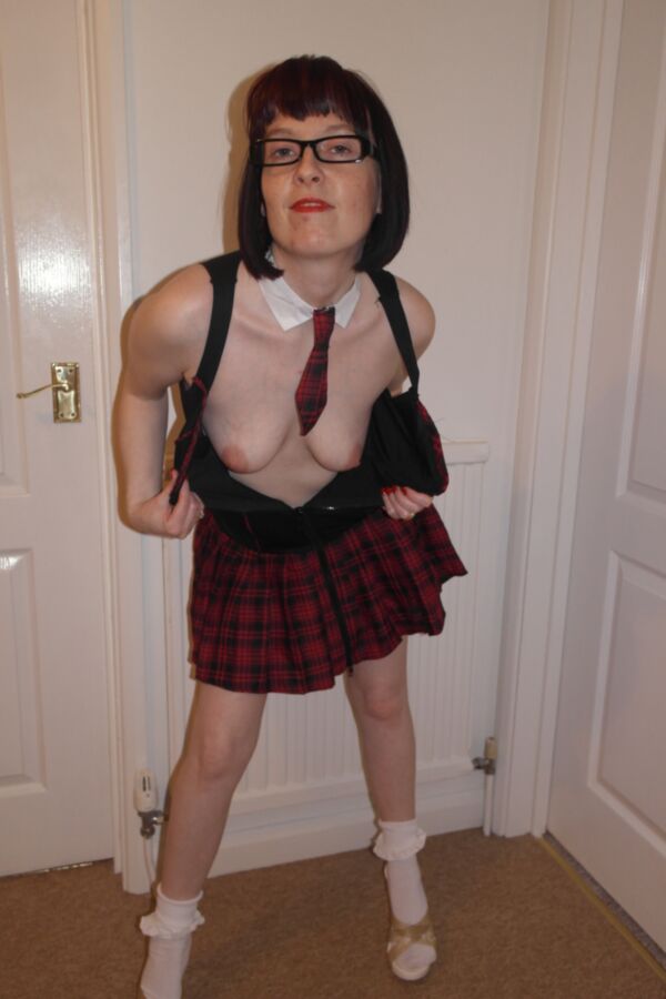 Free porn pics of Wife dressed as a schoolgirl slut 20 of 32 pics