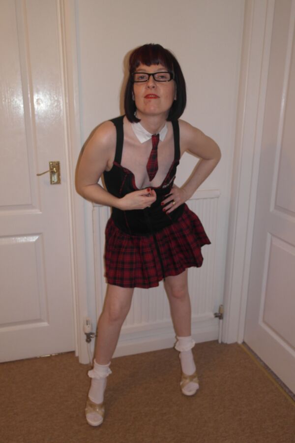Free porn pics of Wife dressed as a schoolgirl slut 18 of 32 pics