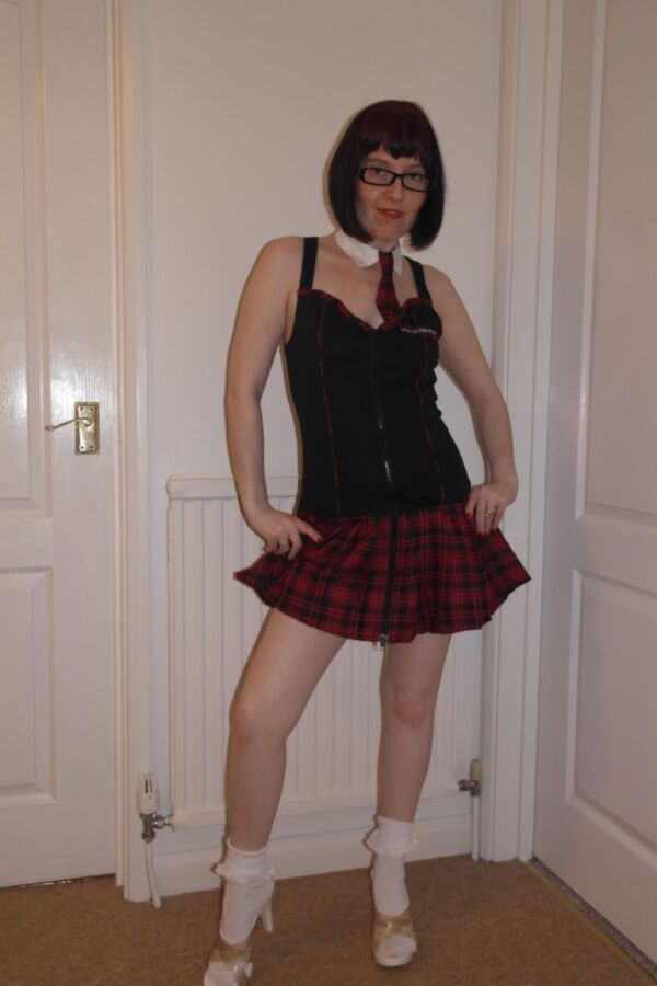 Free porn pics of Wife dressed as a schoolgirl slut 7 of 32 pics