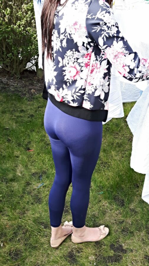 Free porn pics of my slutty girlfriend putting washing out in legging 2 of 2 pics
