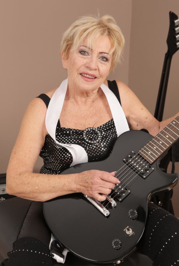 Free porn pics of Granny Malya gets naked with her guitar. 15 of 144 pics
