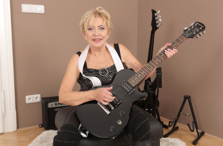 Free porn pics of Granny Malya gets naked with her guitar. 14 of 144 pics