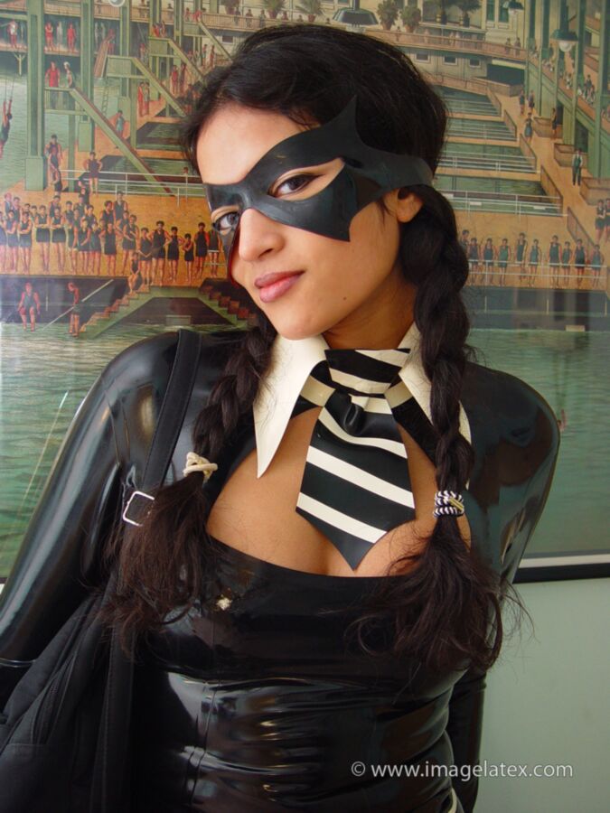 Free porn pics of Masked asian latex fetish babe 2 of 16 pics