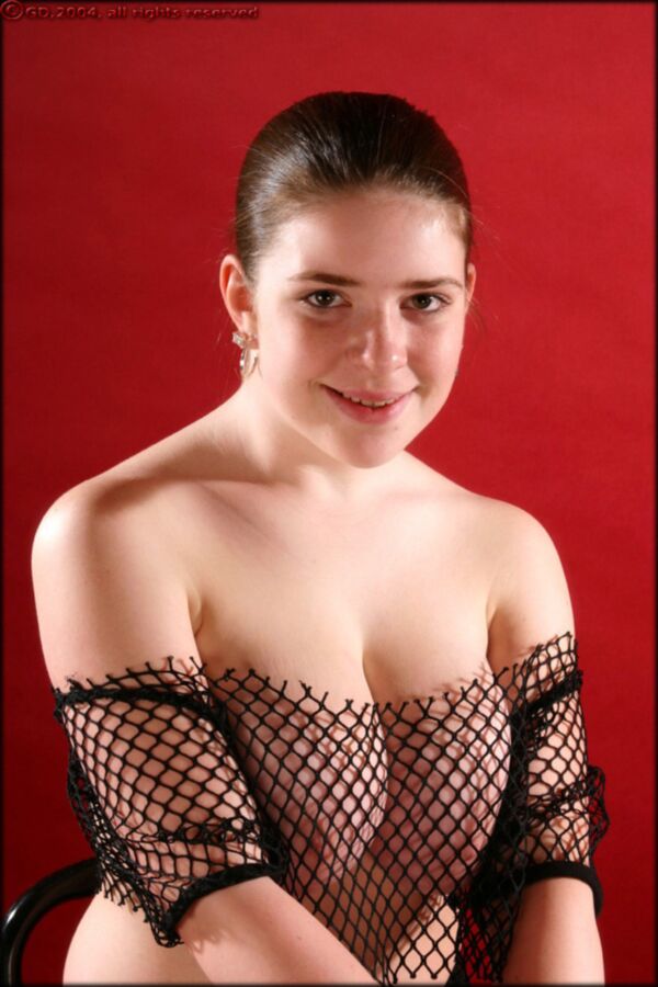 Free porn pics of Lillians big boobs in revealing black fishnet 4 of 117 pics