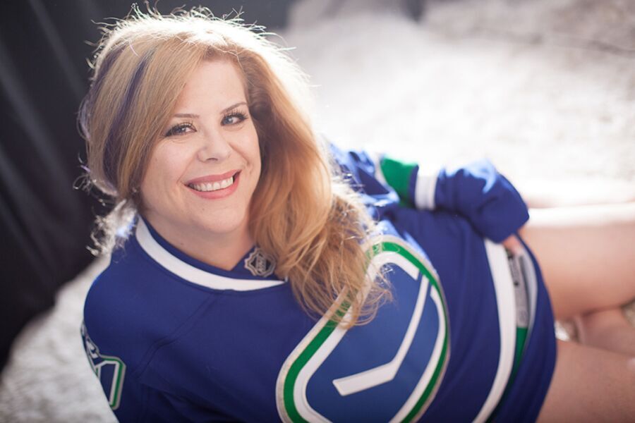 Free porn pics of Woman does boudoir shoot in hockey jersey & glasses 12 of 22 pics
