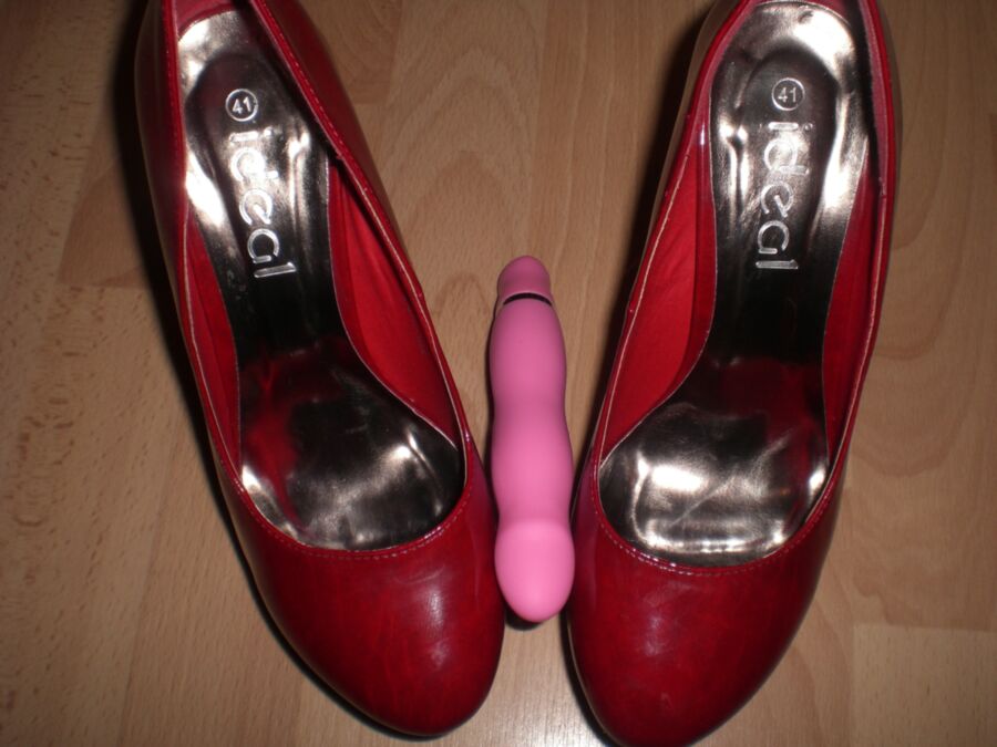 Free porn pics of Cum over her red Heels and her toys 7 of 19 pics