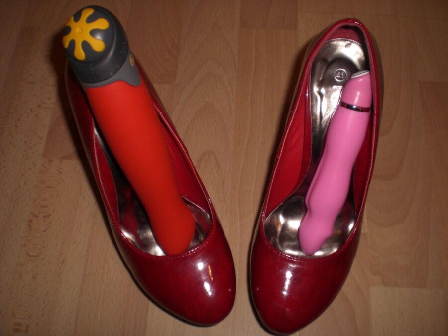 Free porn pics of Cum over her red Heels and her toys 9 of 19 pics