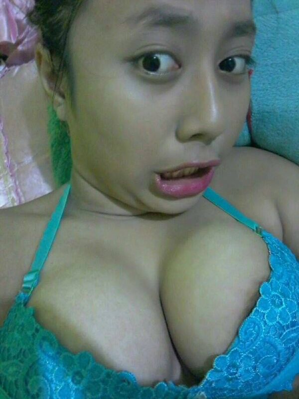 Free porn pics of Indonesian amateur girl shows big tits on cam. 1 of 4 pics