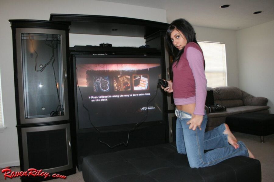 Free porn pics of Raven Riley: videogame stripping 1 of 100 pics