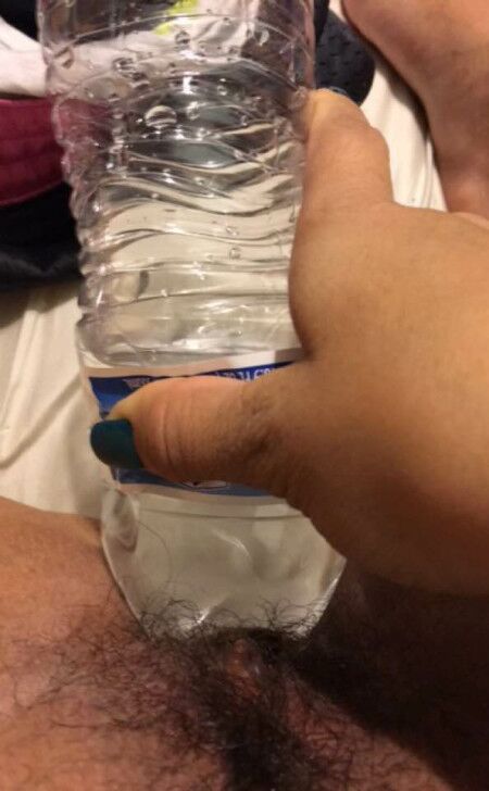 Free porn pics of Water Bottle in my chubby hairy teen pussy  2 of 20 pics