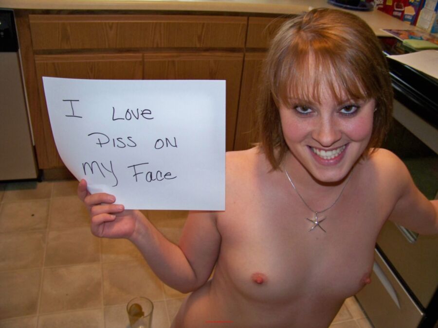 Free porn pics of girls holding signs 5 of 10 pics