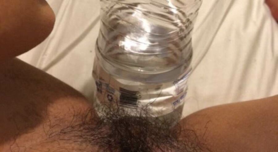 Free porn pics of Water Bottle in my chubby hairy teen pussy  5 of 20 pics