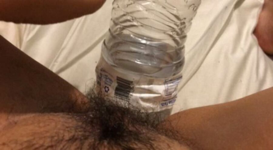 Free porn pics of Water Bottle in my chubby hairy teen pussy  4 of 20 pics