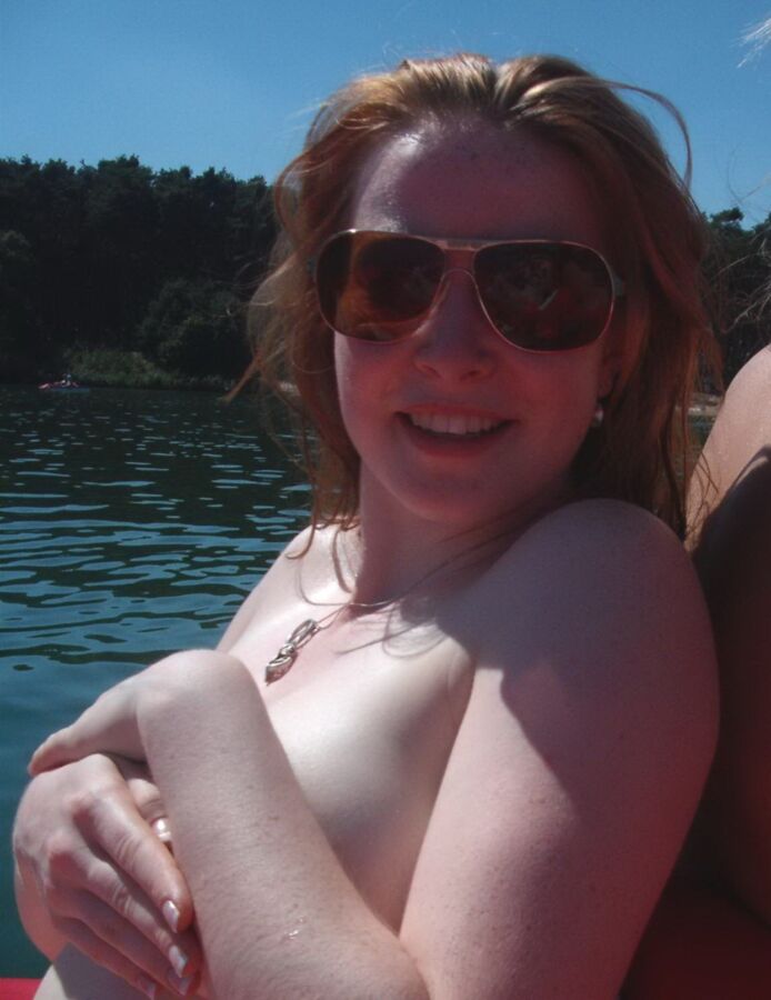 Free porn pics of Focus on the hot redhead at the lake 7 of 9 pics
