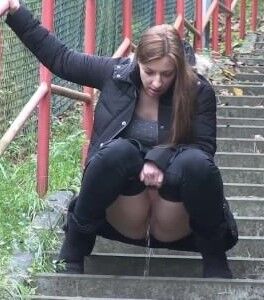 Free porn pics of More pissing ... women doing it in public 14 of 20 pics