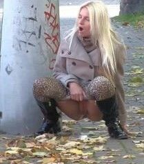 Free porn pics of More pissing ... women doing it in public 16 of 20 pics