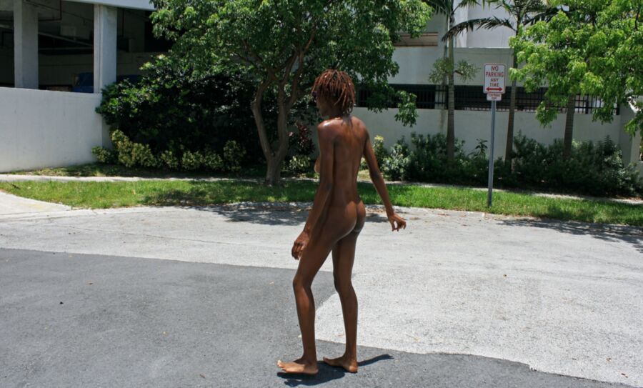 Free porn pics of Black Woman Naked and Barefoot in Public 15 of 26 pics