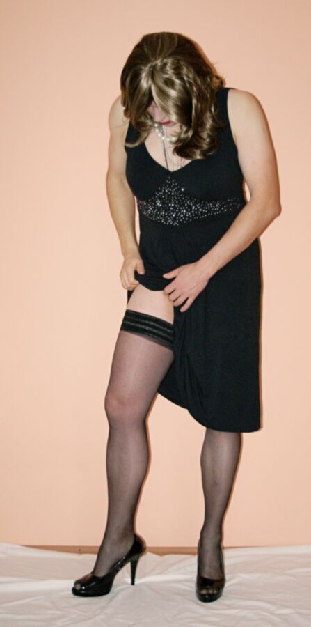 Free porn pics of Black stockings and black dress 16 of 30 pics