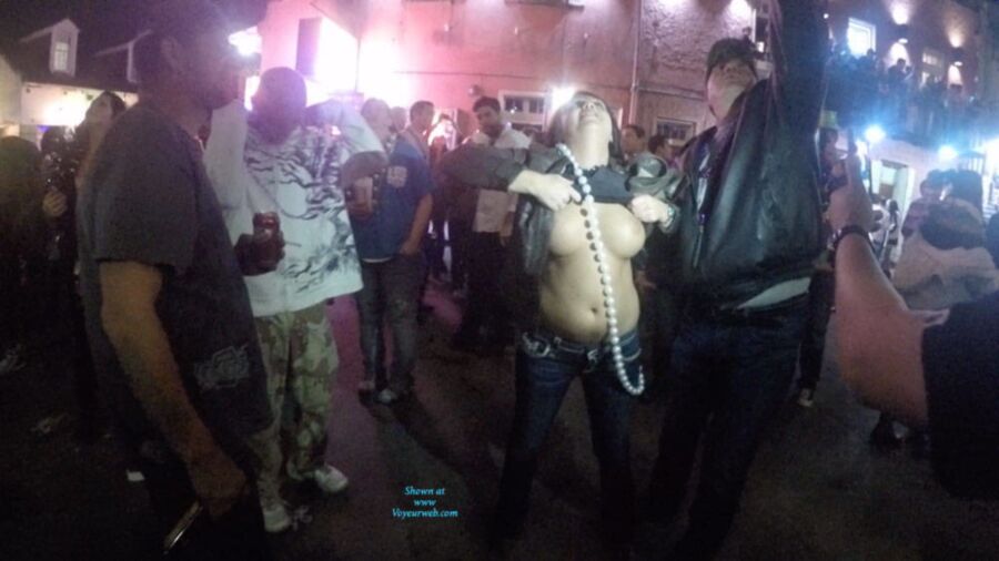 Free porn pics of amateur chicks flashing tits at mardi gras 5 of 40 pics