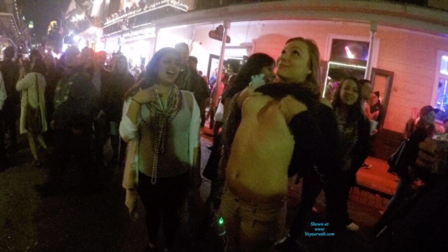 Free porn pics of amateur chicks flashing tits at mardi gras 2 of 40 pics