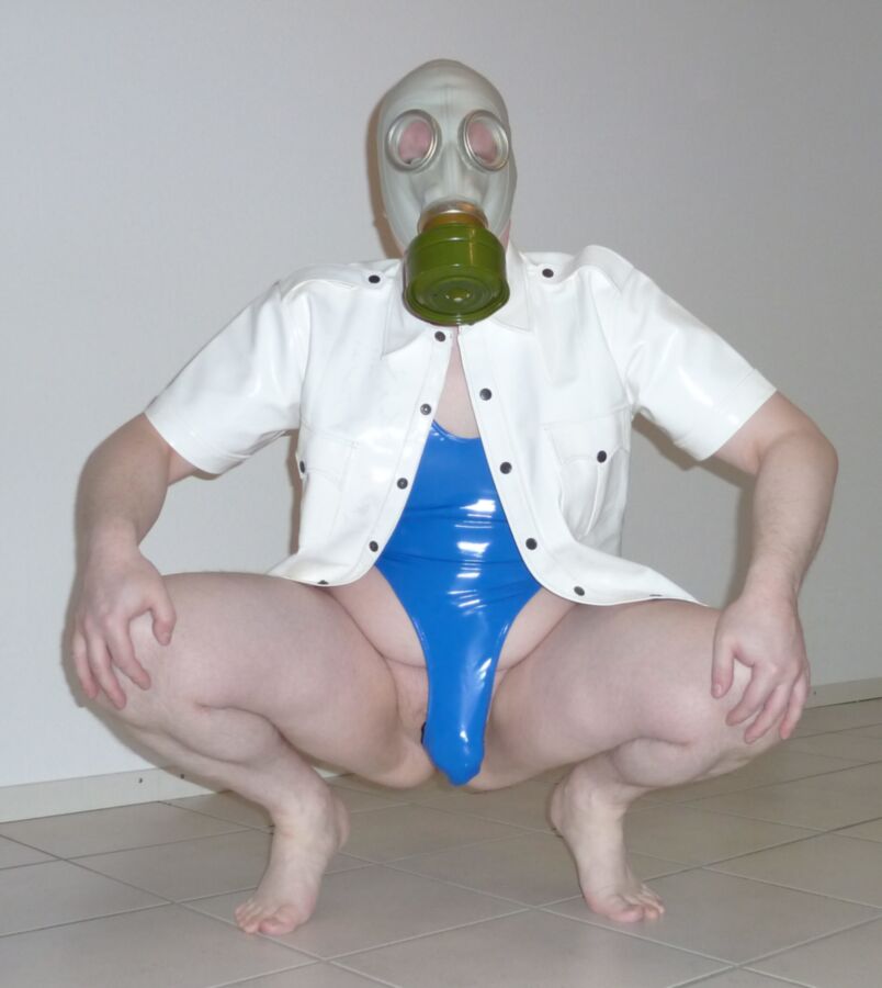 Free porn pics of Gas mask and bathsuit 8 of 17 pics