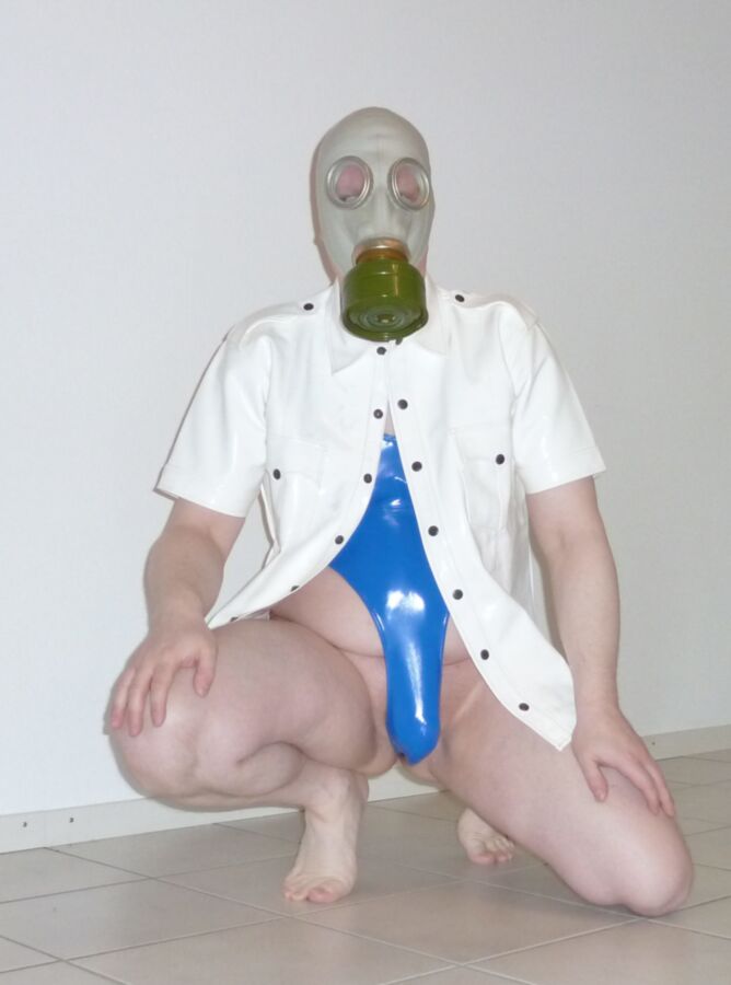 Free porn pics of Gas mask and bathsuit 6 of 17 pics