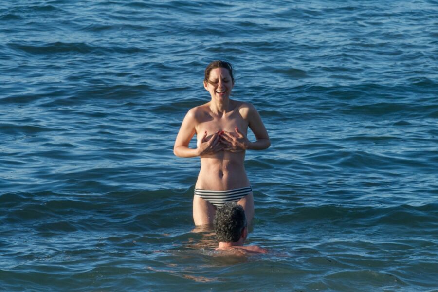 Free porn pics of Marion Cotillard - Topless swimming in Fuerteventura 13 of 23 pics