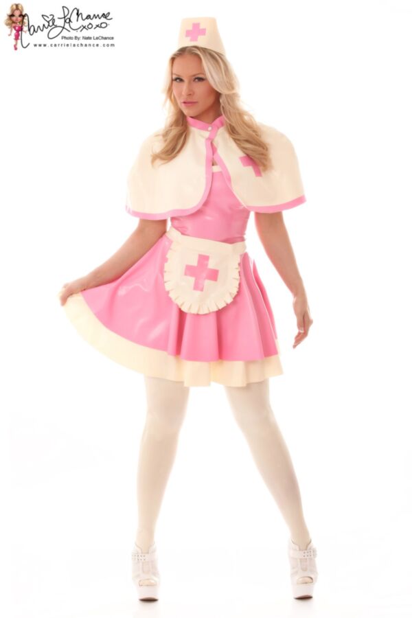 Free porn pics of Carrie The Sexy Latex Nurse In White Platform High Heels 3 of 32 pics