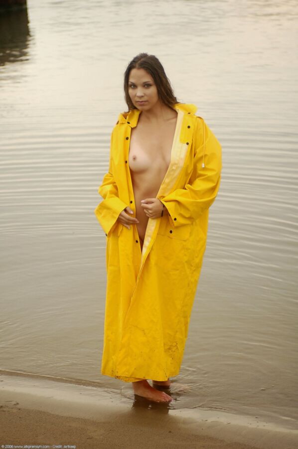 Free porn pics of Beautiful teen in yellow raincoat 7 of 7 pics
