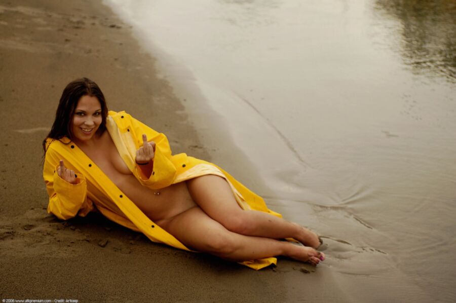 Free porn pics of Beautiful teen in yellow raincoat 4 of 7 pics