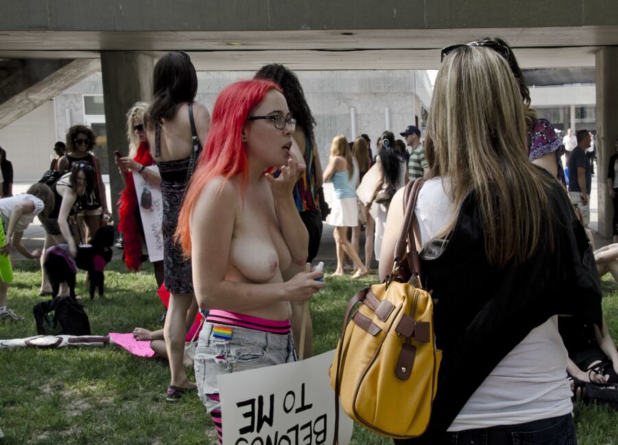 Free porn pics of Beautiful Busty Girl Protesting Topless 9 of 18 pics
