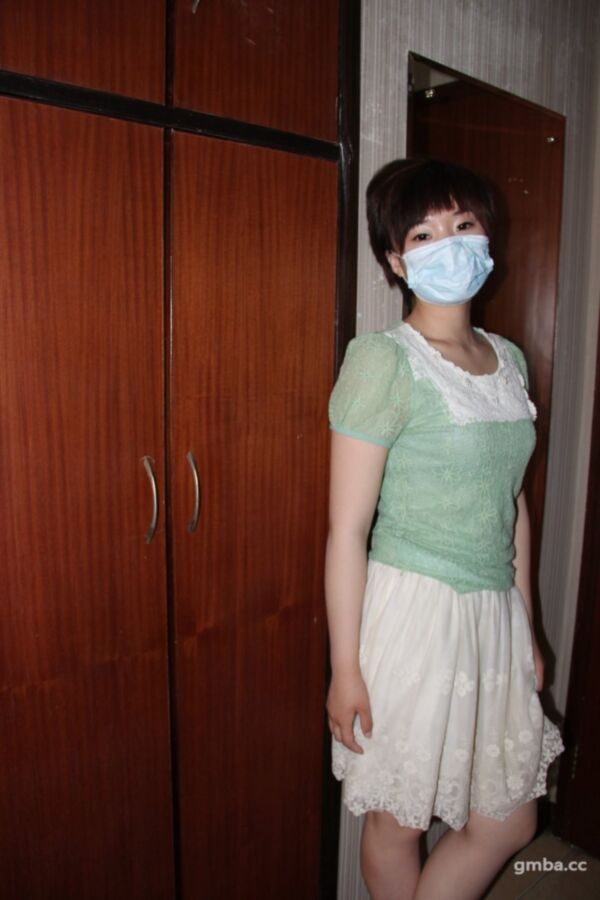 Free porn pics of Chinese woman in mask has a nice Bush 10 of 190 pics
