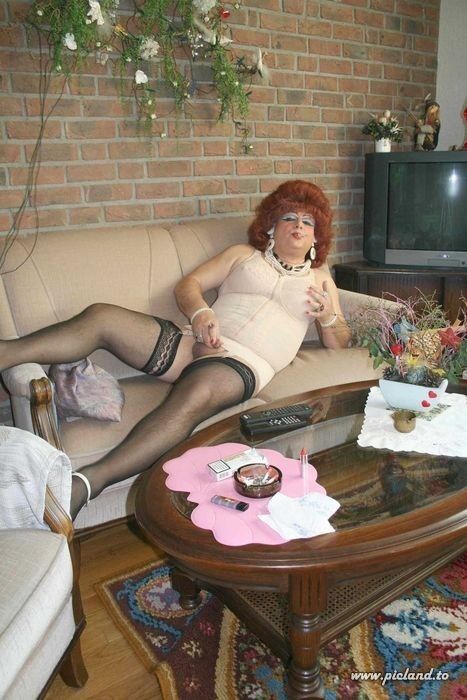 Free porn pics of Mature smoking crossdresser 1 of 9 pics