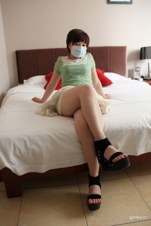 Free porn pics of Chinese woman in mask has a nice Bush 19 of 190 pics