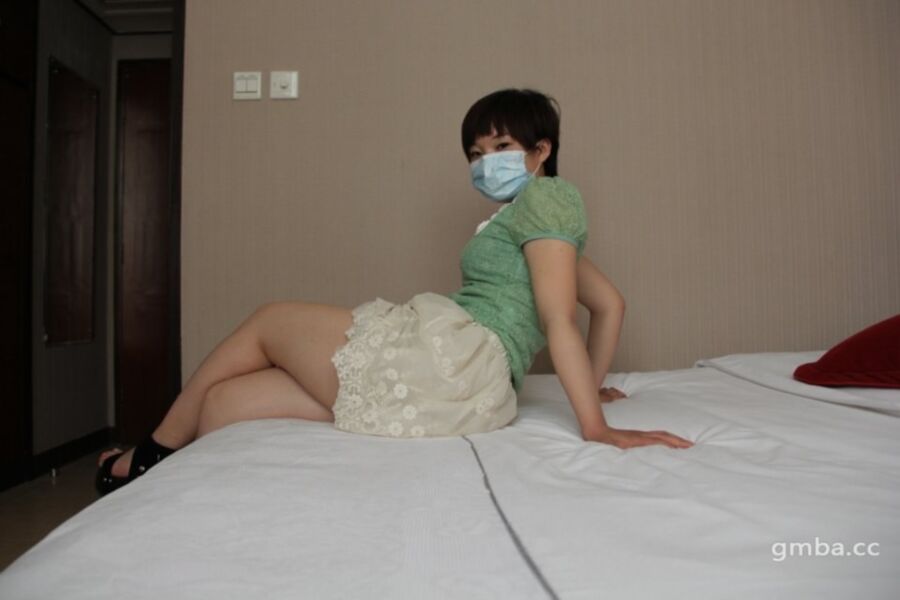 Free porn pics of Chinese woman in mask has a nice Bush 22 of 190 pics