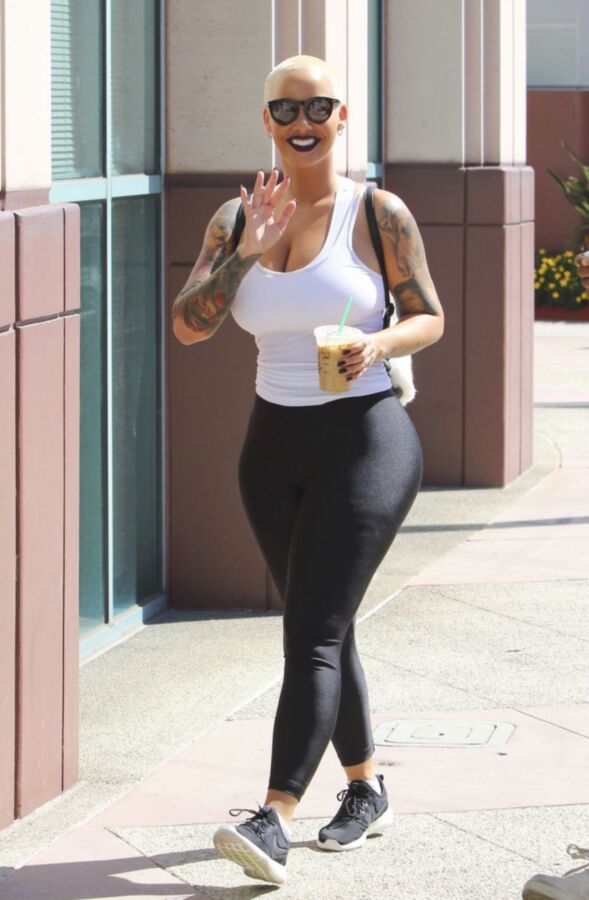 Free porn pics of Amber Rose Slutty ASS in black tights 3 of 16 pics