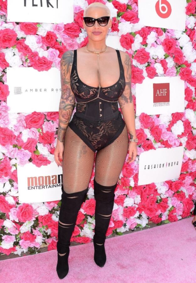 Free porn pics of Amber Rose Slutty ASS in black tights 8 of 16 pics