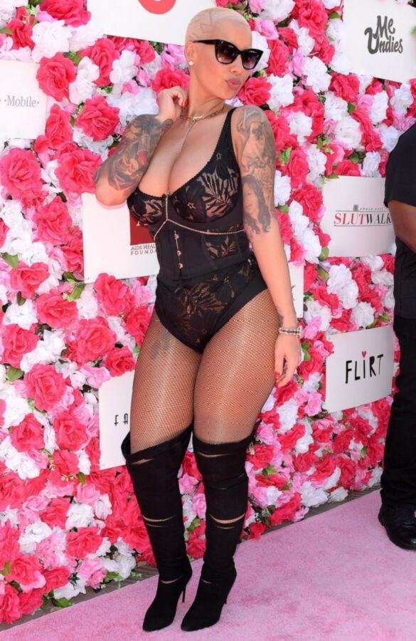 Free porn pics of Amber Rose Slutty ASS in black tights 9 of 16 pics