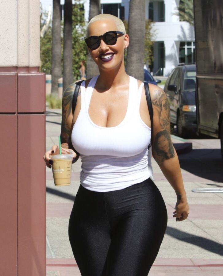 Free porn pics of Amber Rose Slutty ASS in black tights 4 of 16 pics