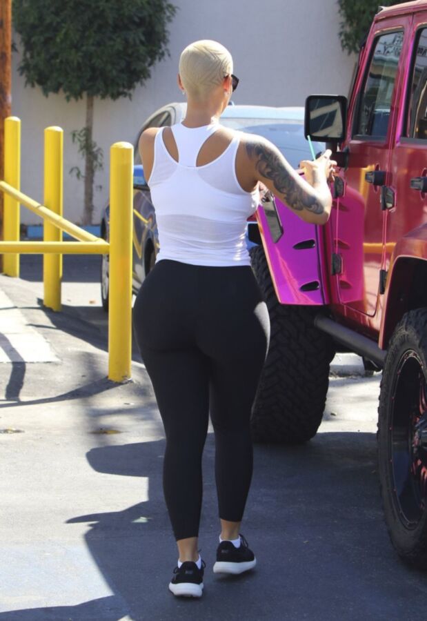 Free porn pics of Amber Rose Slutty ASS in black tights 6 of 16 pics