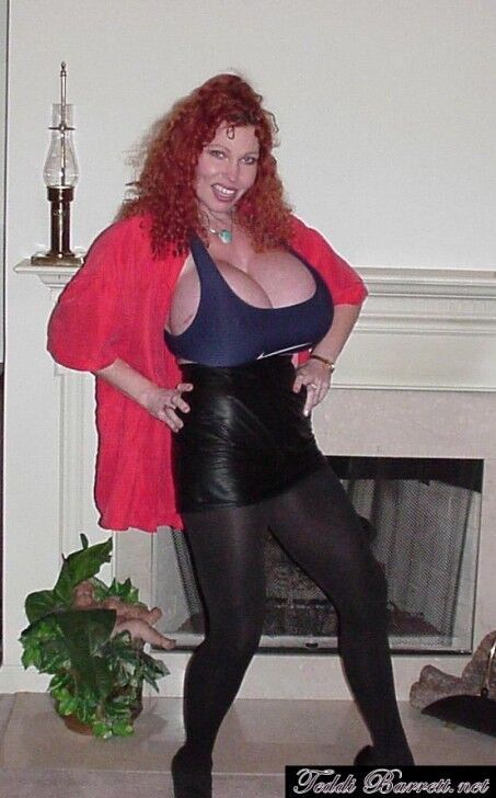 Free porn pics of Teddi Barrett black leather skirt & red top 6 of 43 pics