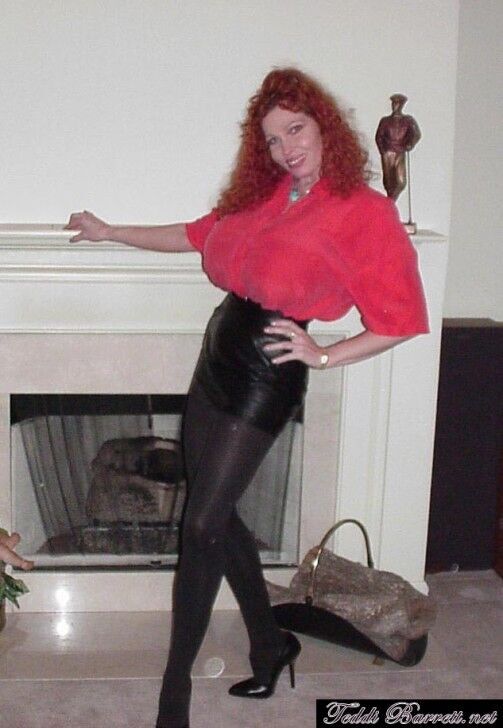 Free porn pics of Teddi Barrett black leather skirt & red top 2 of 43 pics