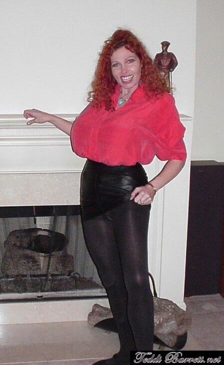 Free porn pics of Teddi Barrett black leather skirt & red top 3 of 43 pics