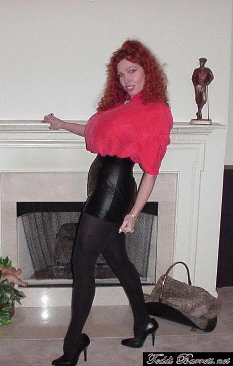 Free porn pics of Teddi Barrett black leather skirt & red top 1 of 43 pics