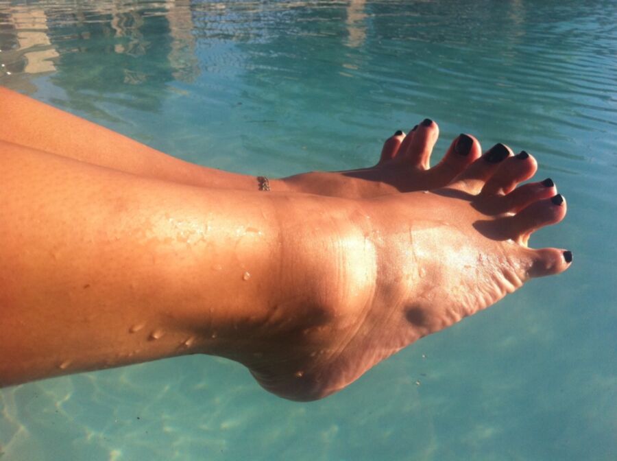 Free porn pics of CUBAN FEET TEASING IN POOL 13 of 13 pics