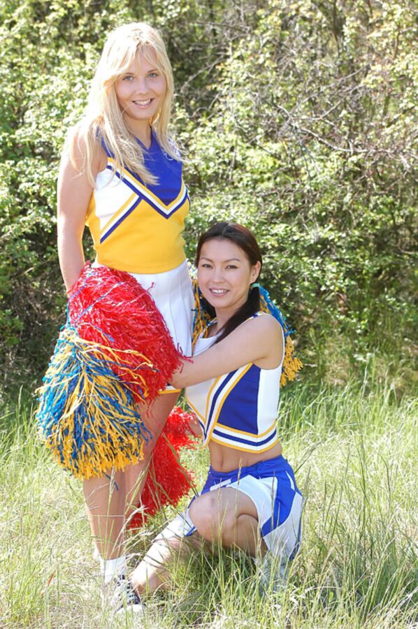Free porn pics of Agnes and friend cheerleaders 5 of 122 pics
