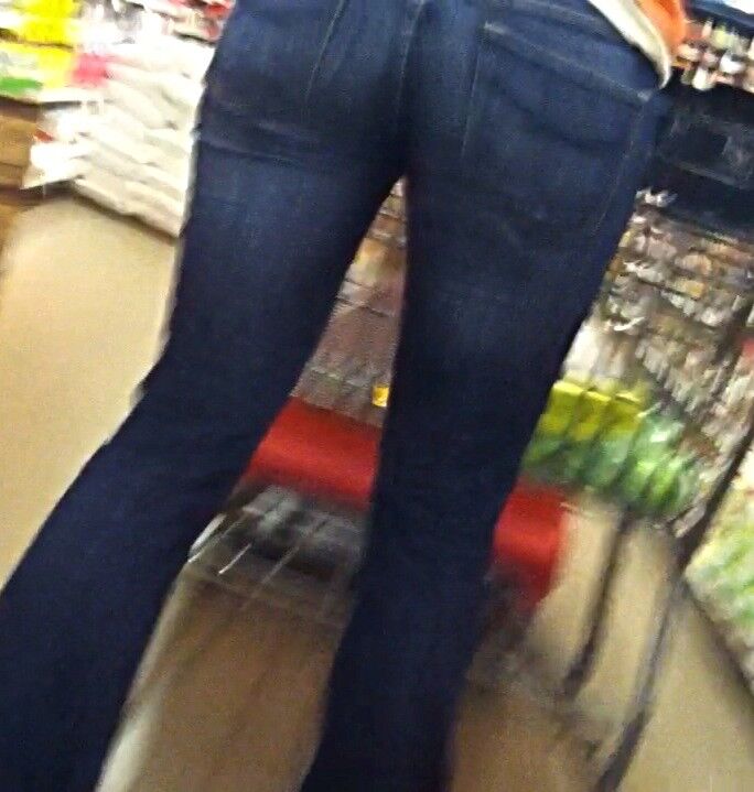 Free porn pics of Blonde MILF in orange top and jeans candid 15 of 16 pics