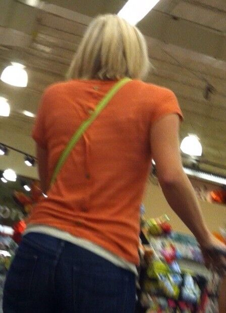 Free porn pics of Blonde MILF in orange top and jeans candid 3 of 16 pics