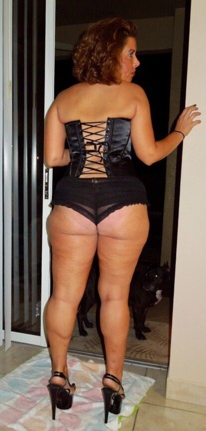 Free porn pics of Chubby milf posing in corset.  11 of 34 pics