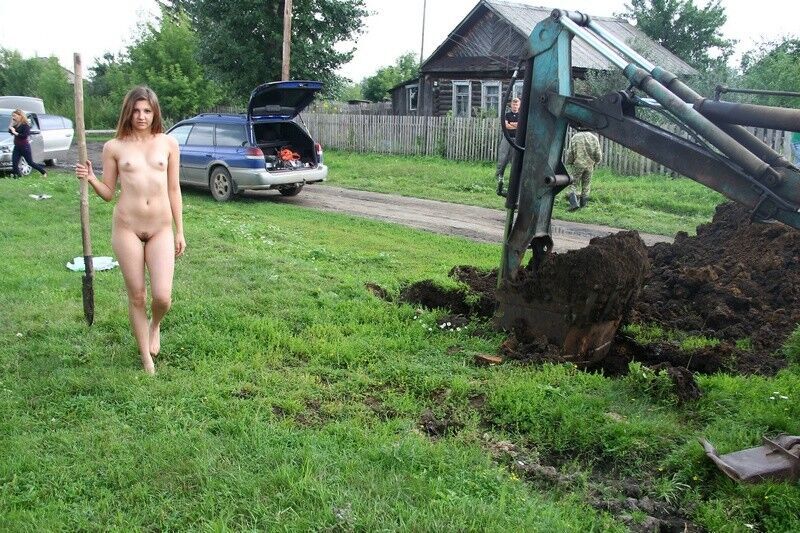 Free porn pics of cute russian female slave working outside 4 of 31 pics